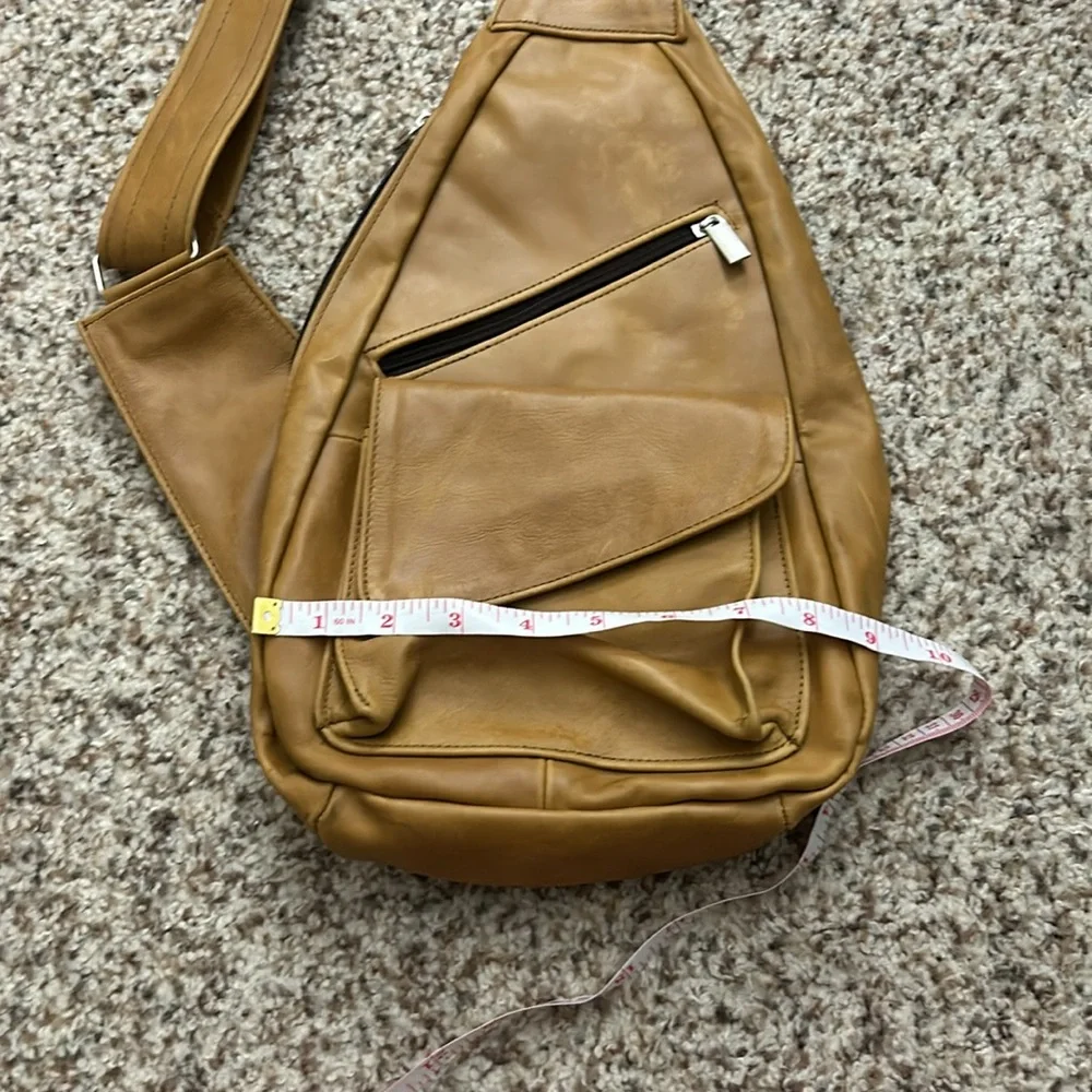Genuine leather sling backpack